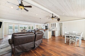 TV, fireplace - Lakefront Gladwin Vacation Rental w/ Deck & Dock! (Gladwin)