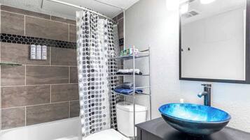 Shower, hair dryer, shampoo