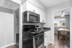 Fridge, microwave, oven, stovetop - 3 Min Walk to AT&T | 2BR | Parking + Pets + Gym (Arlington)