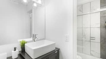 Shower, hair dryer, shampoo