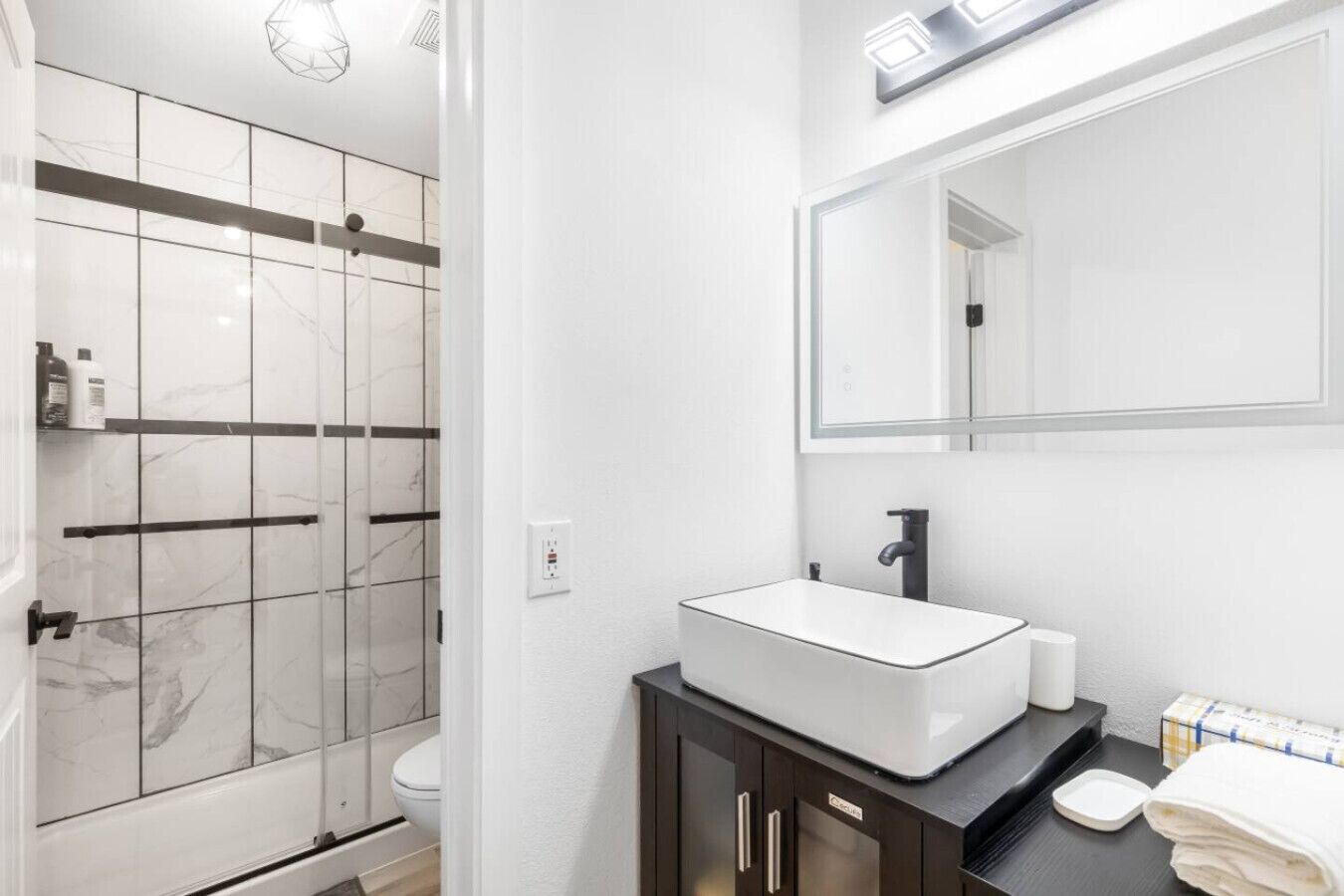 Shower, hair dryer, shampoo