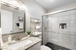 Shower, hair dryer, shampoo