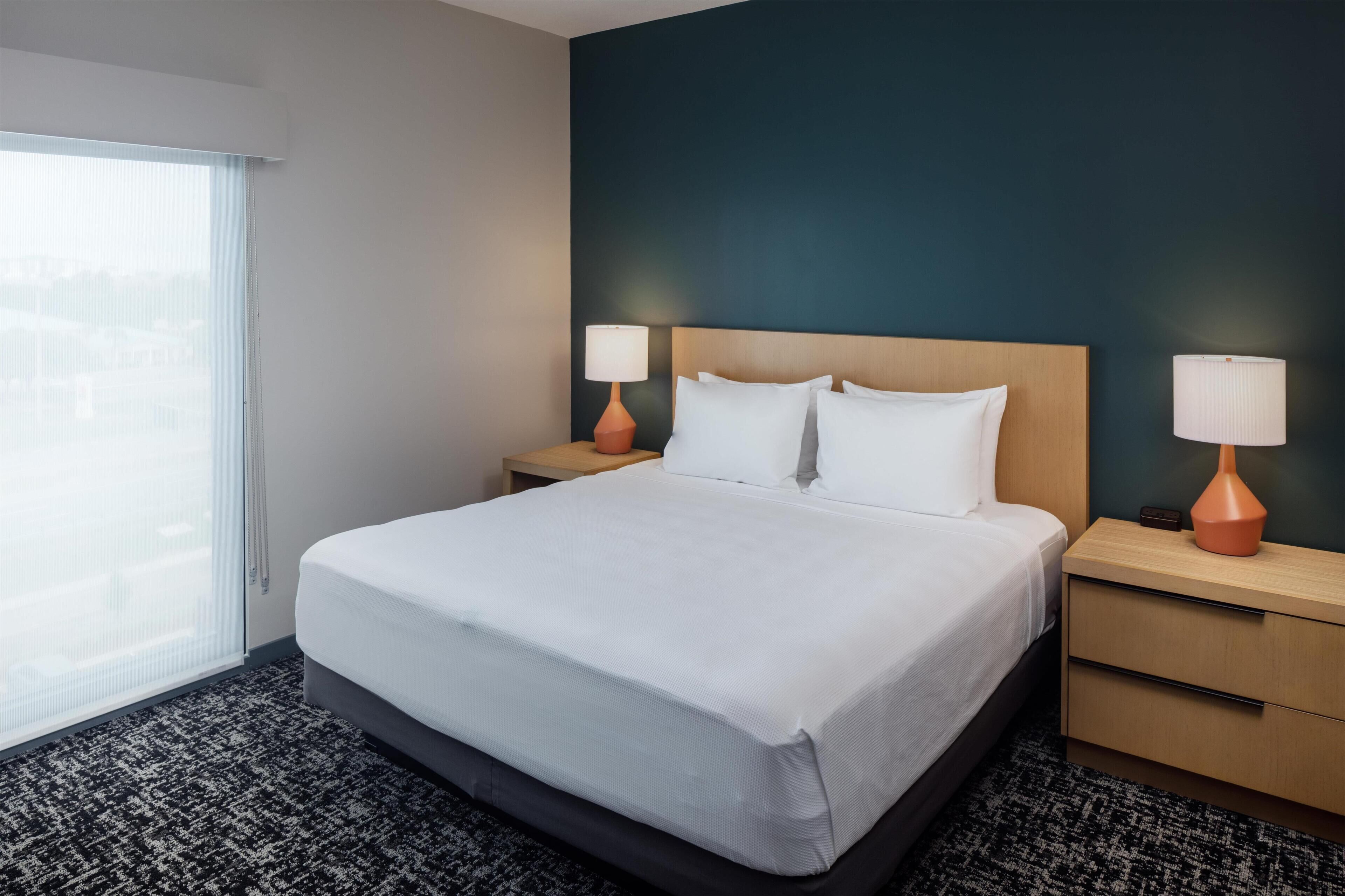 Suite, 1 Bedroom | Desk, laptop workspace, iron/ironing board, WiFi (free)