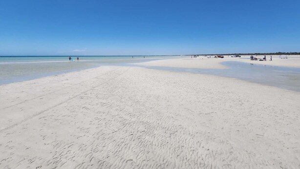 A wide sandy beach with clear blue water and a few people in the distance. - Janet's Rest at Point Turton.
A nostalgic escape nestled on the Yorke Peninsula (Point Turton)