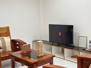 Deluxe-Villa, 2Â Schlafzimmer, Balkon, Gartenblick | Wohnbereich