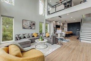 Living area - Luxury Newly Built 4 BR 4 Bath Home w/ Rooftop and Grill! (Dallas)