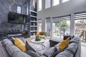 Living area - Luxury Newly Built 4 BR 4 Bath Home w/ Rooftop and Grill! (Dallas)