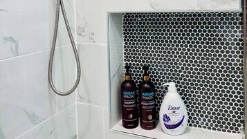 Shower, hair dryer, towels, soap