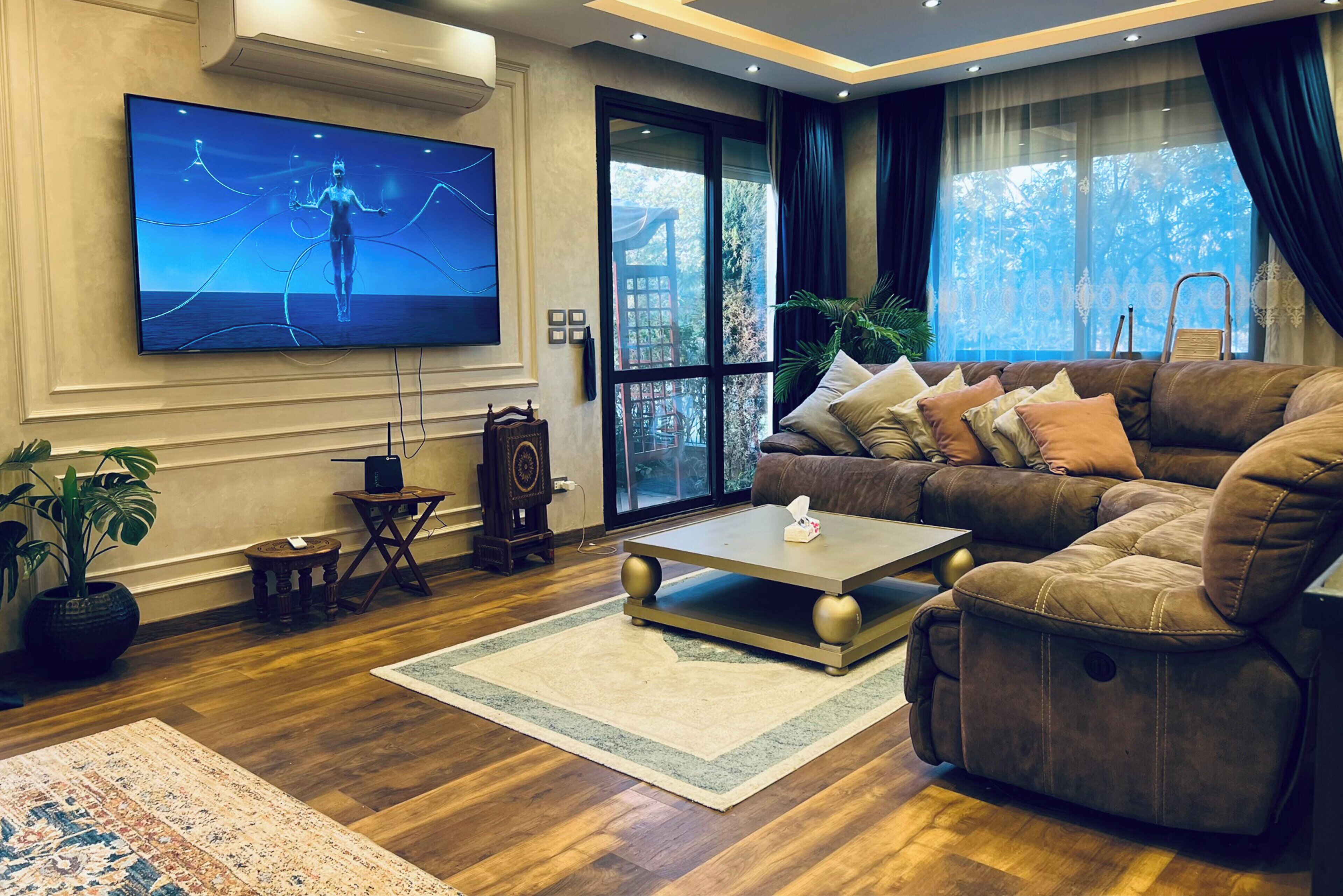 Dúplex, patio, vista al jardín | Área de sala de estar