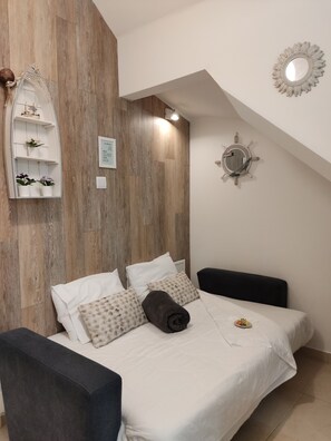 1 غرفة نوم ومكواة/لوح كي وواي فاي وملاءات أسرّة