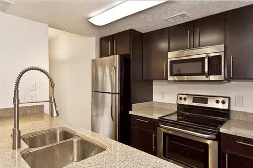 Comforts of home with lakeside view near Airport & Toyota Music Factory