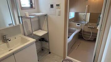 Hair dryer, towels, soap, toilet paper