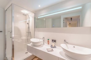 Shower, free toiletries, hair dryer, towels