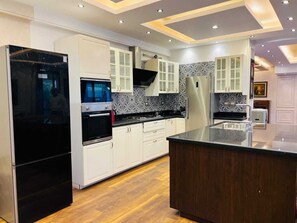 Private kitchen - Alsawah 3BR Duplex with garden in Eastown sodic (New Cairo)
