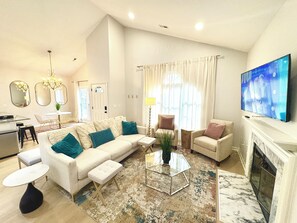 TV - Charming Cary Home-3 Rooms-1 King & 2 Queen Beds with yard & walk paths (Cary)