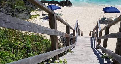 Private pool and private beach in this wonderful Warwick beachfront apartment