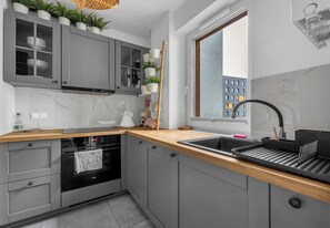 Réfrigérateur, four, plaque de cuisson, lave-vaisselle