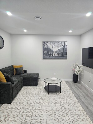 Living area - Cozy on Baywater! 15 minutes from Calgary International Airport (Airdrie)