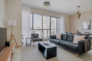 TV, stereo - Blueground | Burj Residence Phase I & II, pool, nr Burj Khalifa (Dubai)