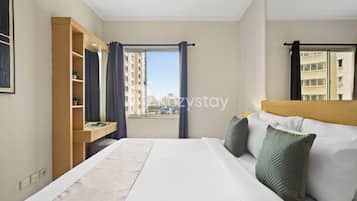 Apartment, 2 Bedrooms, City View | Desk, laptop workspace, iron/ironing board, free WiFi