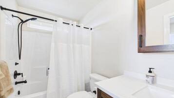 Hair dryer, towels, soap, toilet paper