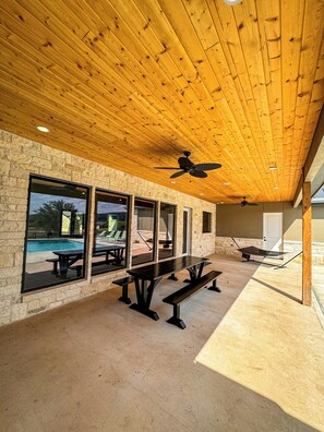 Outdoor dining - Out of Bounds, pool, Frio River, sleeps 24 (Concan)