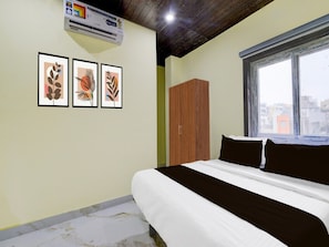 Casa | 1 habitación y tabla de planchar con plancha