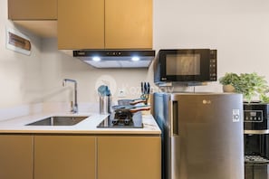อพาร์ทเมนท์, 1 ห้องนอน, วิวทะเล | ครัวส่วนตัว | ตู้เย็นขนาดใหญ่, ไมโครเวฟ, เตาประกอบอาหาร, หม้อหุงข้าว