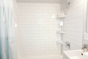 Shower, hair dryer, towels, shampoo - Sojourn Tide Suite 2 BR 2 BA at Beach Cottages #11 (Norfolk)