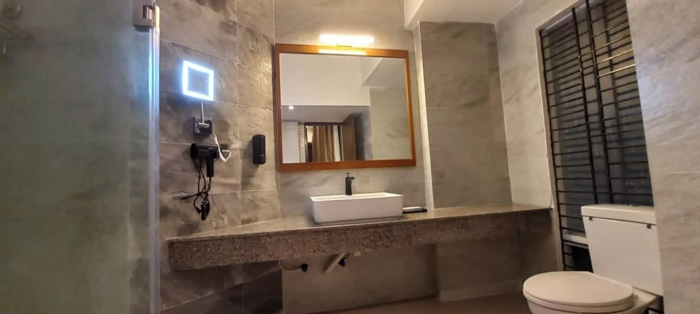 Deluxe Double Room, Balcony, City View | Bathroom | Bathtub, free toiletries, slippers, towels