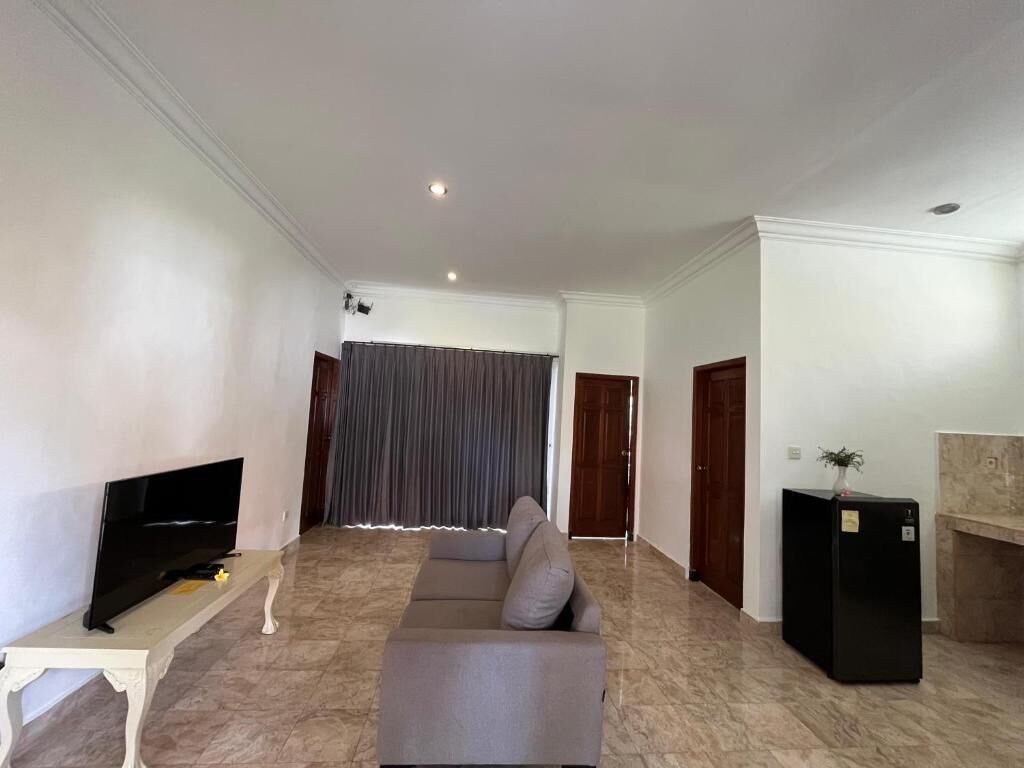 Villa, 2 Bedrooms, Non Smoking, Courtyard Area | Living area | 32-inch flat-screen TV with satellite channels