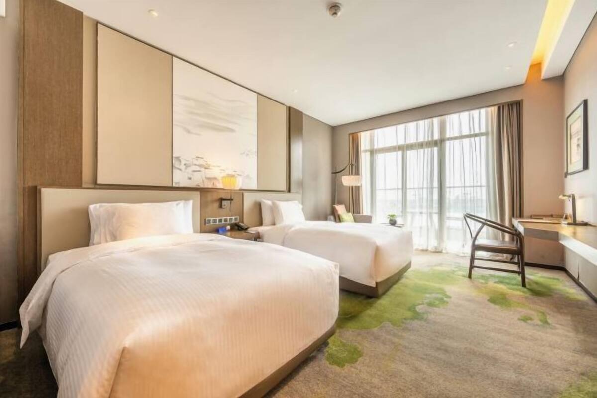 Couette en duvet d'oie, matelas mémoire de forme, minibar