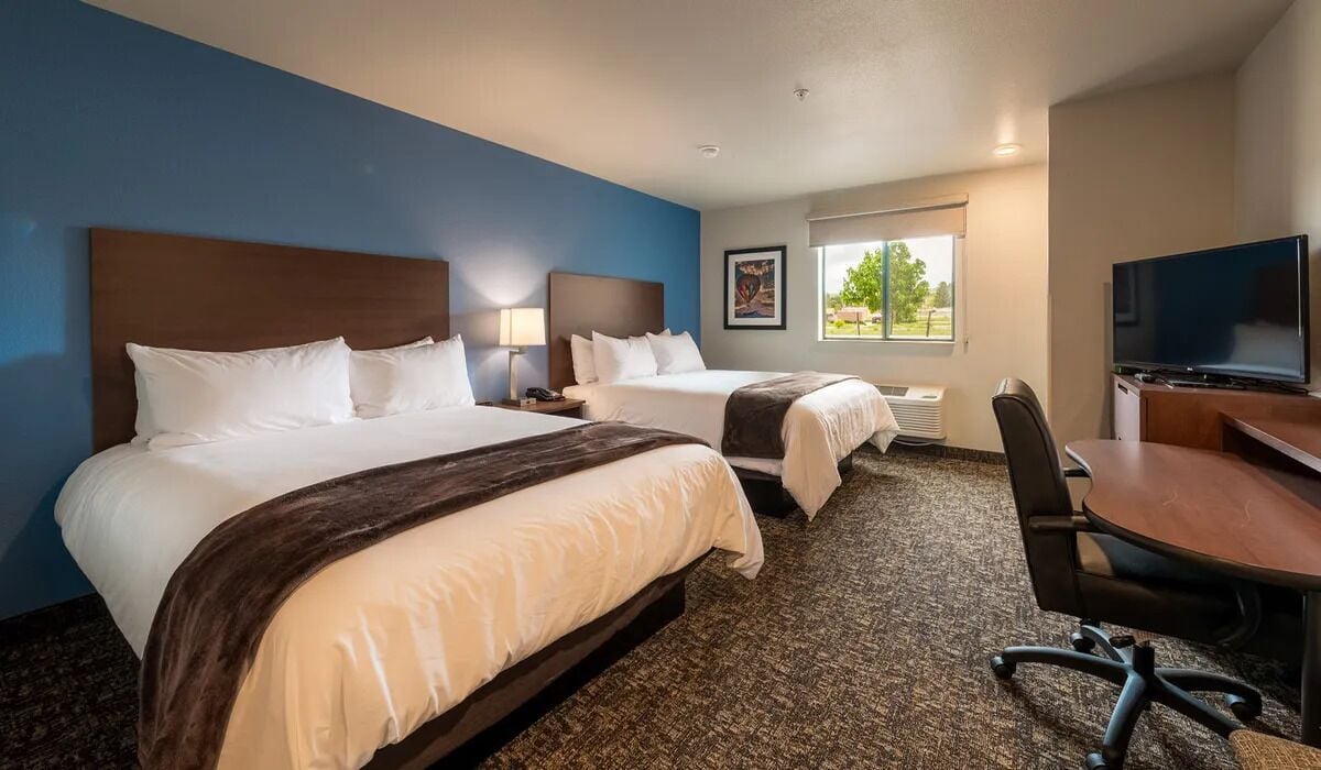 Settle into crisp bedding and unwind in your spacious room.