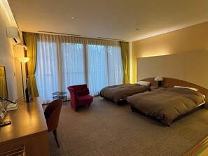 Family Quadruple Room, Lanai, Garden View | Desk, laptop workspace, free WiFi