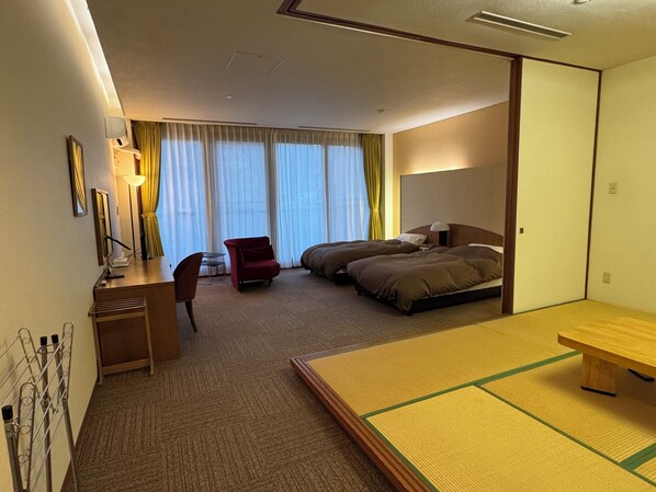 Family Quadruple Room, Lanai, Garden View | Desk, laptop workspace, free WiFi