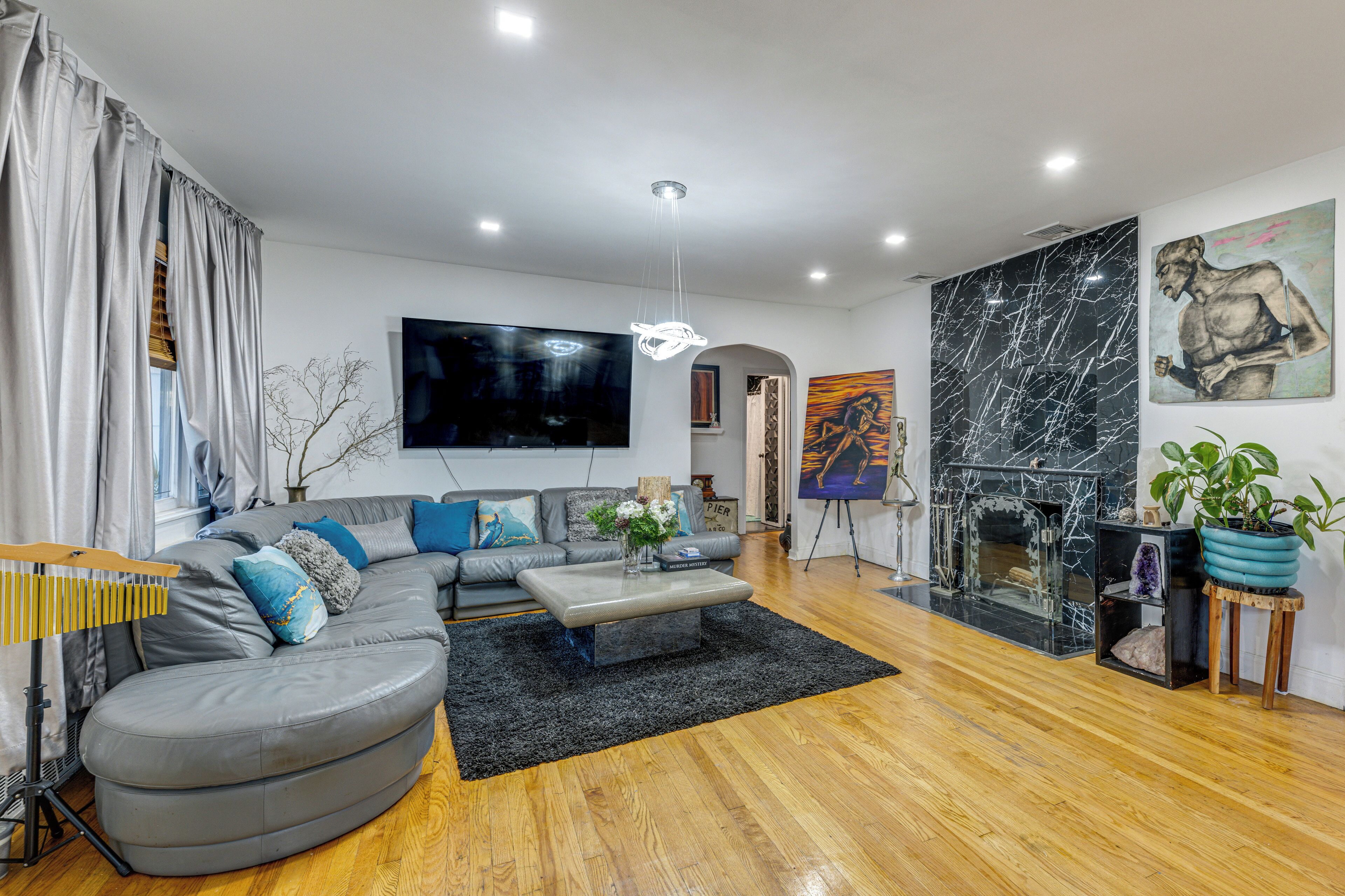 TV, fireplace, books