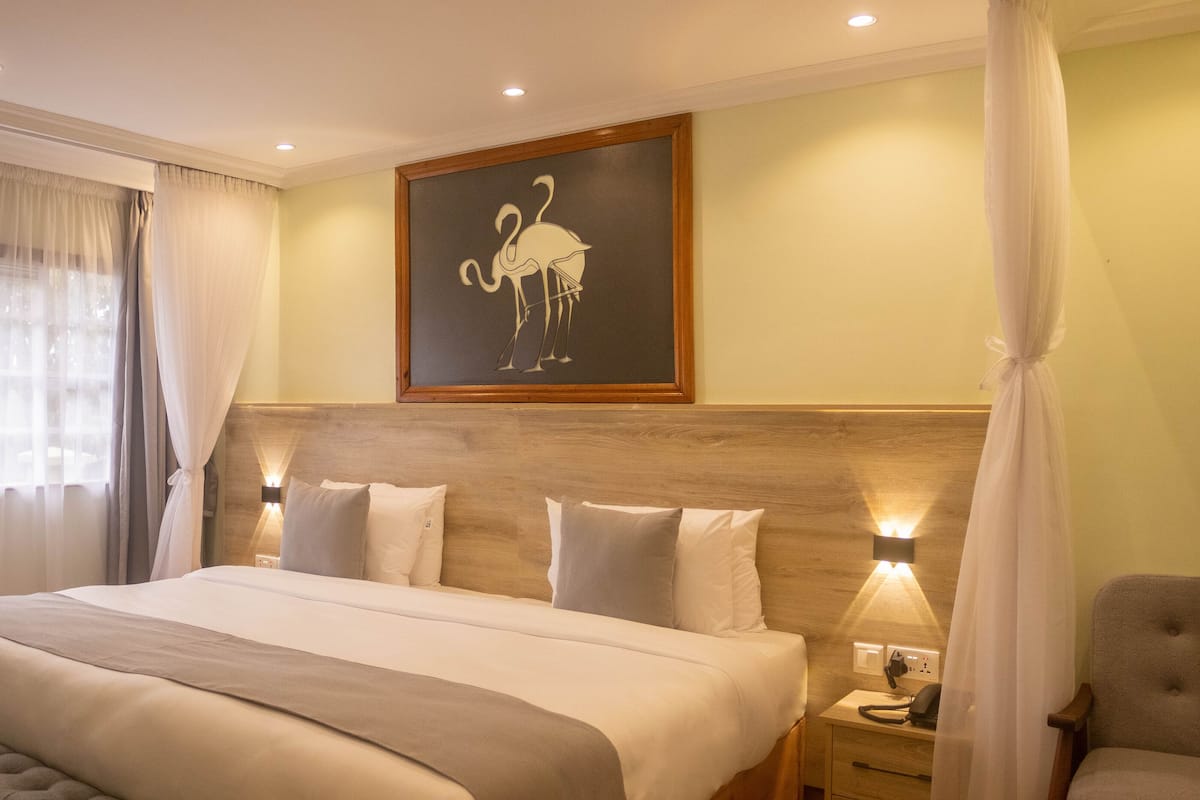 Habitación Deluxe doble | Caja fuerte, wifi gratis, ropa de cama