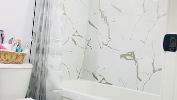 Hair dryer, towels, soap, toilet paper