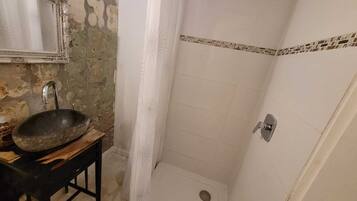 Shower, hair dryer, towels, toilet paper