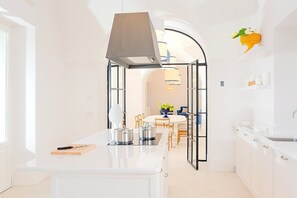 Stovetop, dishwasher, coffee/tea maker, cookware/dishes/utensils - Villa Auralia Grande: A charming and bright two-story historical villa surrounded by a lemon and orange garden, with Free WI-FI. (Massa Lubrense)