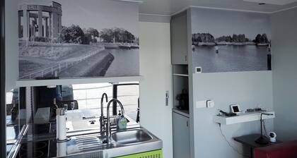 Tiny Griffin houseboat, relaxing on the water