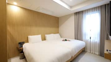 Family Twin Room | Premium bedding, down duvets, pillow-top beds, in-room safe
