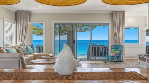 Beachfront Breeze - Family Getaway by HolidayCo.