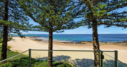 Beachfront Breeze - Family Getaway by HolidayCo.