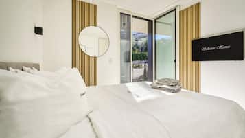 Luxury Condo, Lake View | In-room safe, desk, laptop workspace, blackout curtains