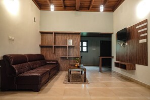 ファミリー ダブルルーム バルコニー ガーデンビュー | リビング エリア