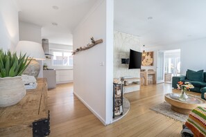 TV, fireplace, books, stereo