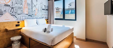 Memory-foam beds, desk, laptop workspace, soundproofing
