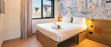 Memory-foam beds, desk, laptop workspace, soundproofing