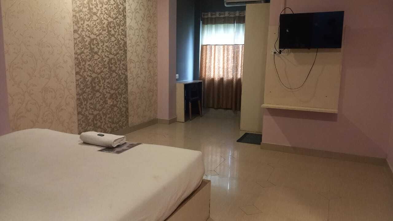 Habitació estàndard, balcó, vistes a la ciutat | Matalassos de la marca Select Comfort i escriptori 